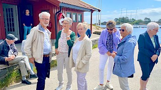 Et bilde som inneholder klær, person, himmel, utendørs