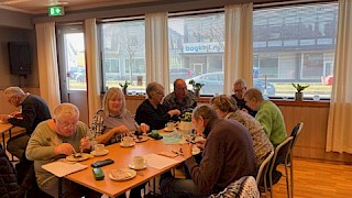 Viser personer som spiser